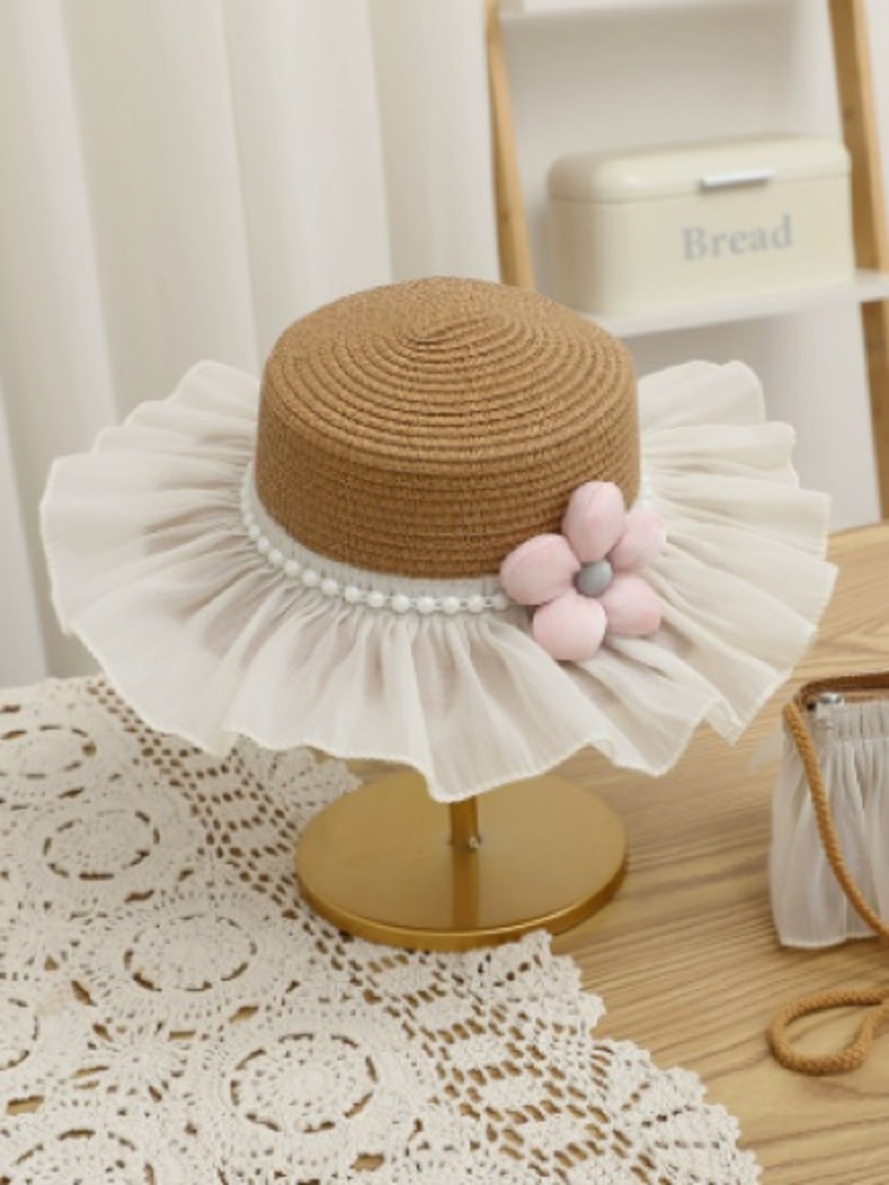 Brown Straw Sun Hat with White Ruffle and Pink Flower
